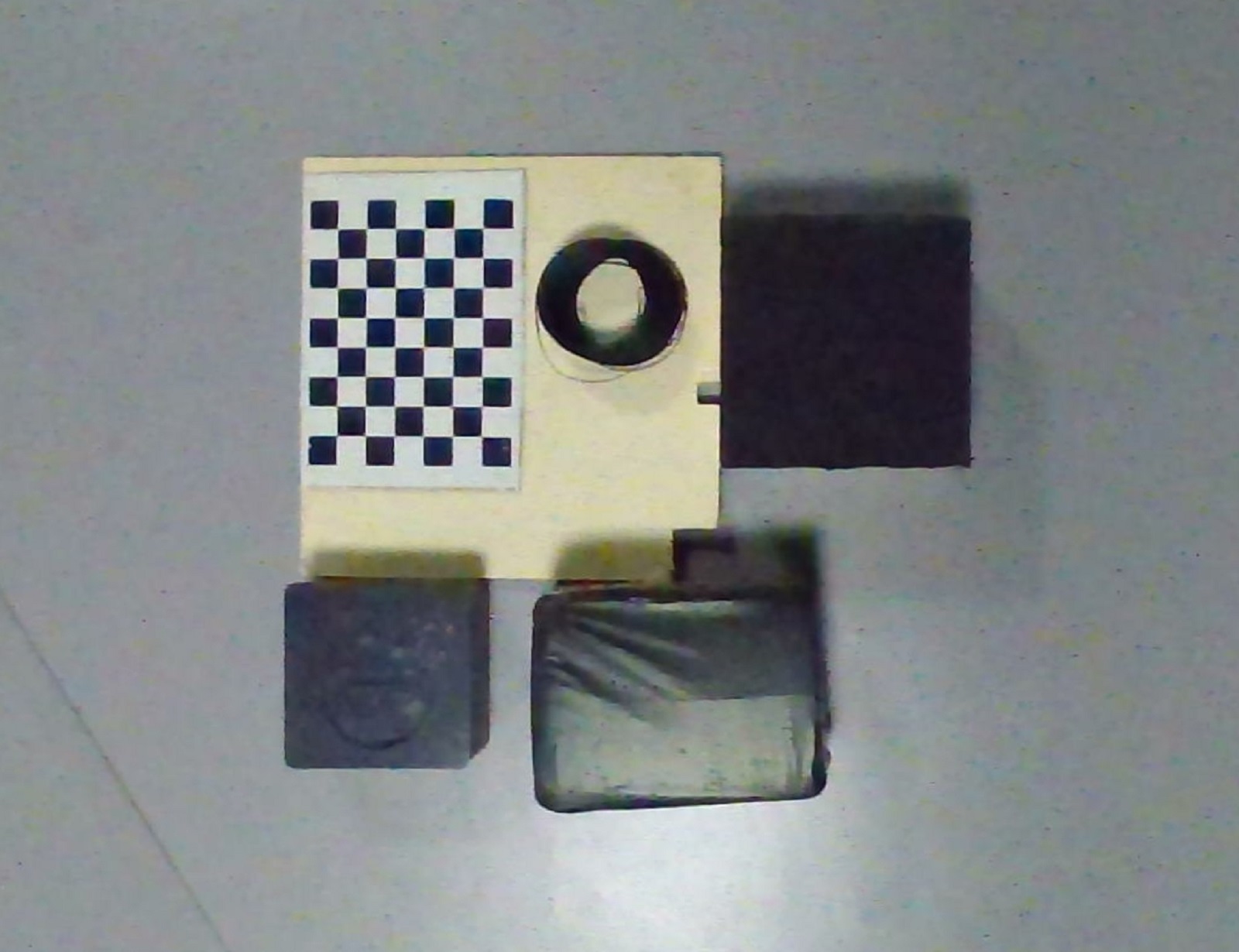 Checkerboard and Black Objects